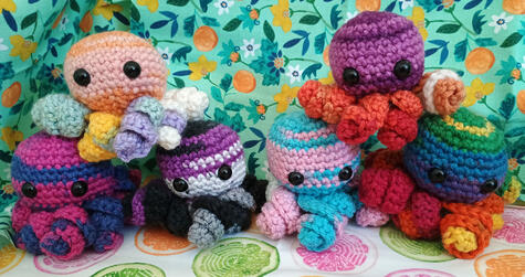 Pride colored octopuses with pastel rainbow, bisexual, nonbinary, transexual, lesbian, and rainbow variants