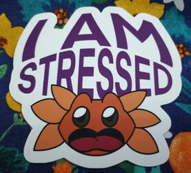 An orange axolotl SCREAMING with the text I AM STRESSED